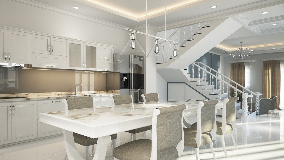 Finished basement renovation with warm lighting